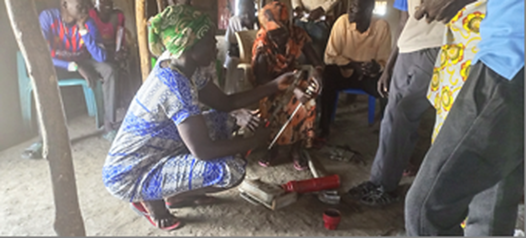 Female hand-pump mechanic trainee